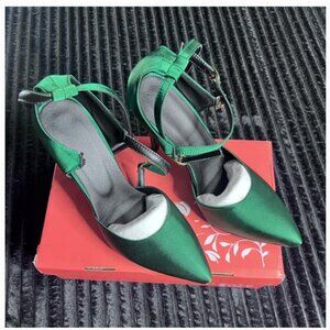 Green high heel shoes